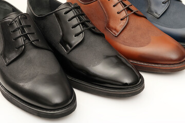 Elegant handmade leather shoes on a white background