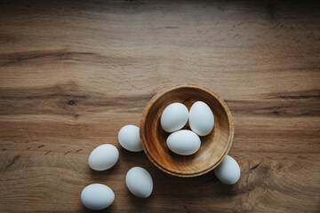 eggs white Easter holiday wooden background