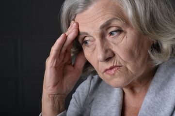 sad  senior woman posing  isolated