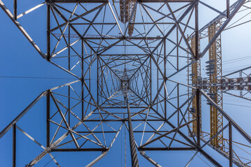 Electric pylon shot taken from beneath, with nice blue sky.
