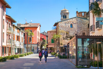 historic center of Sirmione. View of a touristic street in a famous italian landmark near Verona