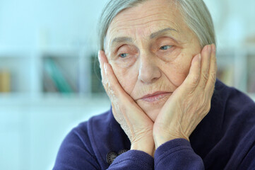 Close up portrait of sad senior woman