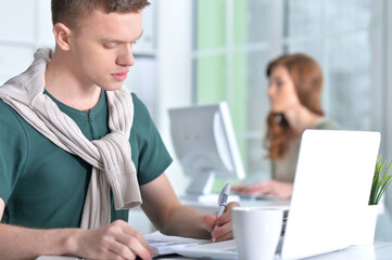 young people working in office