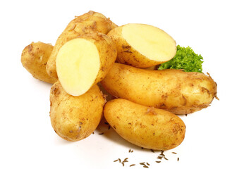 Fresh Vegetables - Washed New Potatoes with Caraway Seeds on white Background Isolated