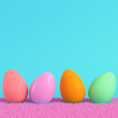 Colorful easter eggs on the grass on bright blue background in pastel colors. Minimalism concept