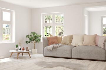 White living room with sofa and summer landscape in window. Scandinavian interior design. 3D illustration
