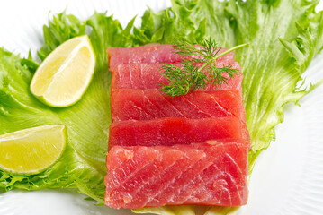 tuna sushi, Tuna carpaccio, tuna sashimi with vegetables. healthy eating with seafood, we cook at home