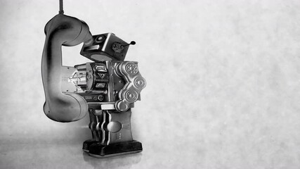 retro robot on an old phone robot call with copy space  - Powered by Adobe