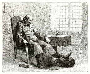 Russian officer in exile, dejected seated putting a foot on a footstool indoor in a poor room. Ancient grey tone etching style art by unidentified author, Le Tour du Monde, 1862