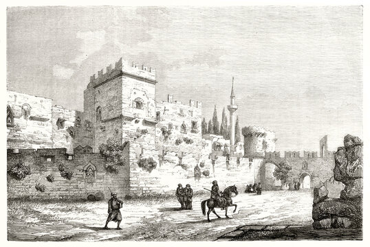 Palace of the Grand Master of the Knights of Rhodes outdoor view. Few people and horseback knight walking around it. Ancient grey tone etching style art by Laly, Le Tour du Monde, 1862