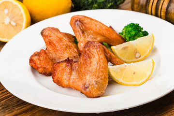 A plate of freshly baked chicken wings