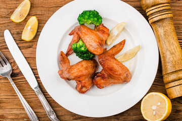 A plate of freshly baked chicken wings
