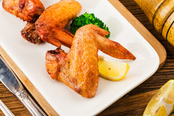 A plate of freshly baked chicken wings