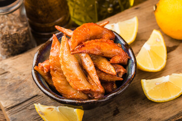 A plate of freshly baked chicken wings，Chicken Wing Tip