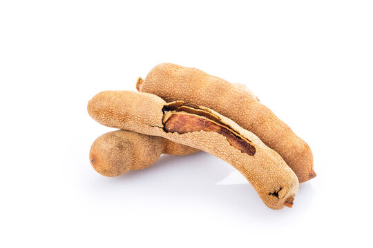 Tamarind (Tamarindus indica) fruit isolated on white background