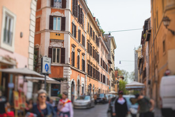 Fototapeta na wymiar Trastevere district, Rome, Italy, view of rione Trastevere, Roma, with historical narrow streets, Municipio I, west bank of Tiber in Rome, Lazio, Italy, cozy streets with restaurants and architecture