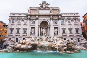 Fototapeta na wymiar The Trevi Fountain (in Italian: Fontana di Trevi), a fountain in the Trevi district in Rome, Italy, Baroque fountain, with a crowd of tourists around