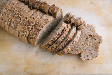 Bread with seeds on a wooden board