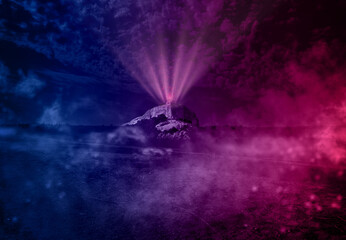 view of the valley with a high mountain at night, at the top of the mountain peak neon circle with pink glow and rays