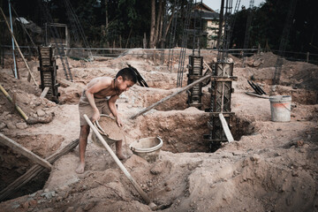 Children who work hard on the construction site, child labor , World Day Against Child Labour...