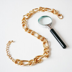 big golden chain on white background, pawnshop concept, jewerly shop concept