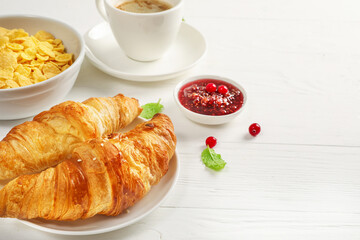 Delicious breakfast with fresh croissants