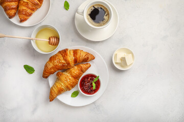 Delicious breakfast with fresh croissants