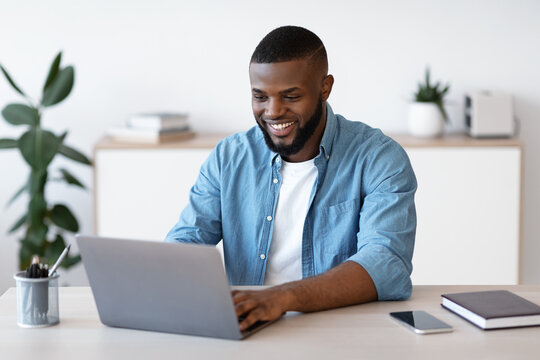 Distance Job. Millennial African American Man Working On Computer At Home Office