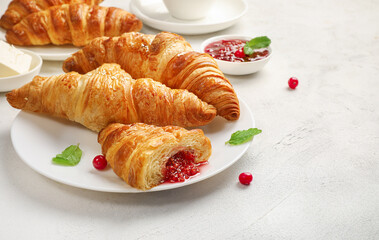 Delicious breakfast with fresh croissants