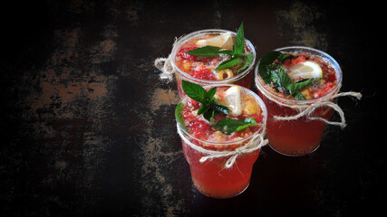Homemade lemonade in glasses. Fruit kvass or kambucha. A healthy drink for parties.