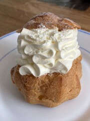 whipped cream puff on a plate 