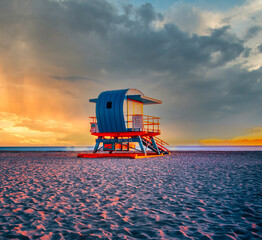 lifeguard tower at sunset Miami Beach florida beautiful sky clouds summer tropical vacation 