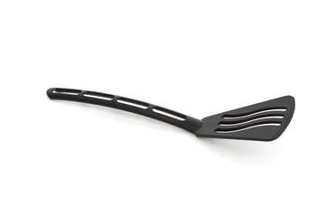 black food spatula on white background