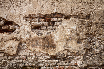 Old brick and plaster wall texture background