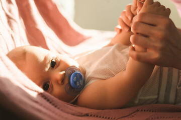 Young mother and her baby close-up. Happy family concept.