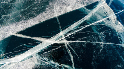 Cracked Ice of Frozen Baikal Lake in Winter. Top Down View