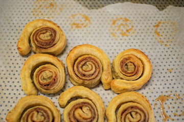 Obraz na płótnie Canvas Closeup homemade veggie hot cinnamon cinnabon rolls or buns