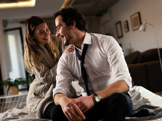 Young man having a problem. Girlfriend comforting her sad boyfriend..