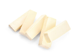 Pieces of fresh butter isolated on white background.