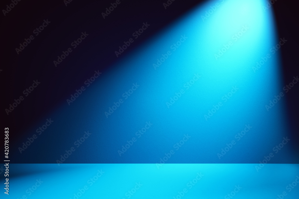 Poster empty blue studio background illuminated by spotlight. place for displaying your product.