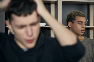 Staged photo illustrates problems and conflicts in gay couple relationships. Moment of showdown:...