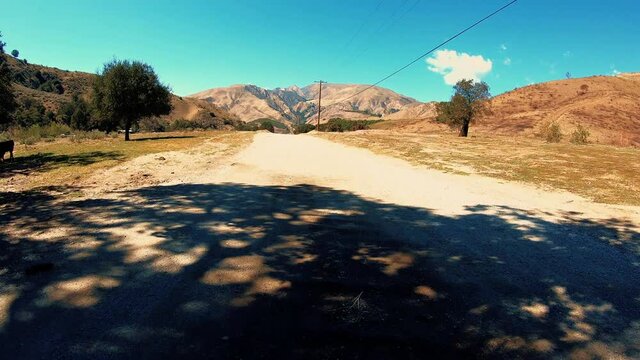 Driving On A Private Dirt Road In An Empty Ranch