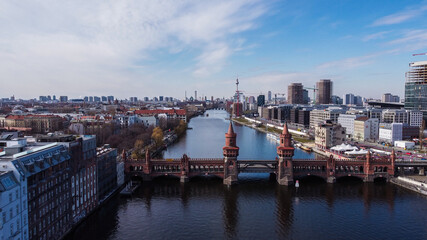 Fototapeta na wymiar River Spree in the city of Berlin with Oberbaum Bridge - urban photography