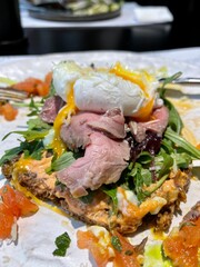 bruschetta with beef and poached egg