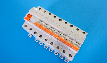 Automatic differential current switch and circuit breakers on a blue background. Electrical...