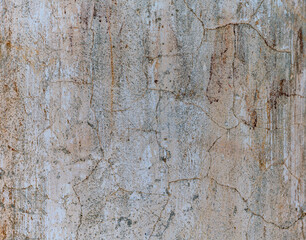 The texture of old plaster in an abandoned rural church in the Ural village of Kashina (Russia). She is over 170 years old. Close-up 