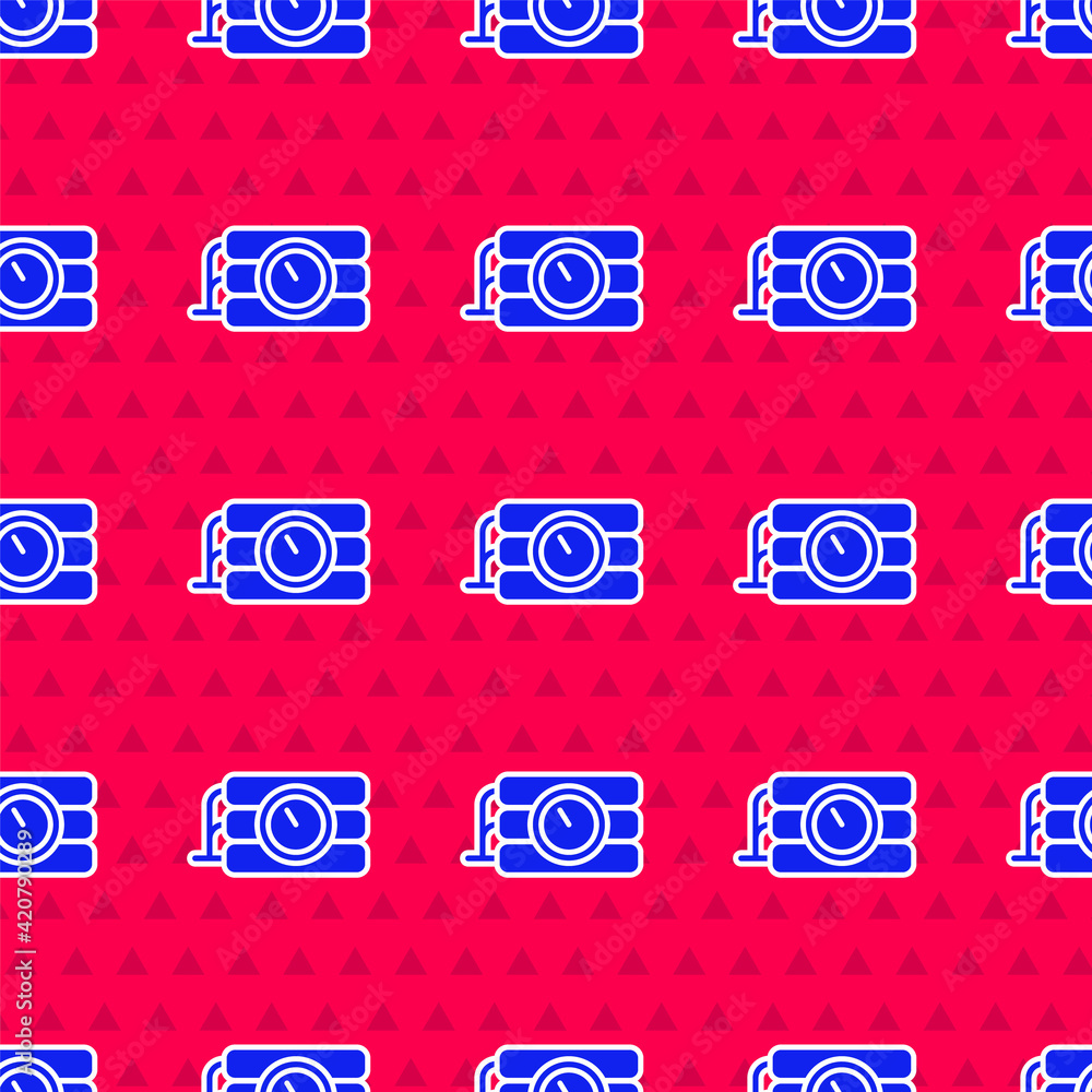 Poster blue detonate dynamite bomb stick and timer clock icon isolated seamless pattern on red background. 