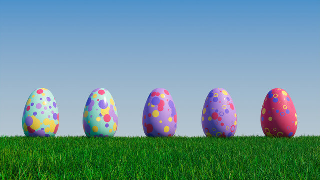 Easter Eggs on a grass lawn, with a clear blue sky. Beautiful Purple, Red and Aqua Eggs with Circle and Ring patterns. 3D Render