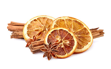 Dry orange with  cinnamon and  anise on white background closeup. Citrus with spices.
