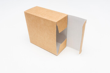 Open cardboard box, white background, copy space